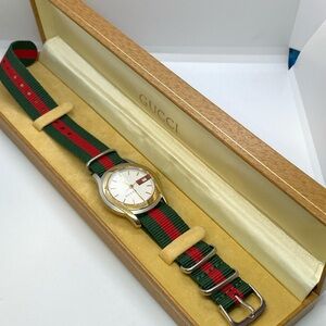 - Gucci 5500 watch